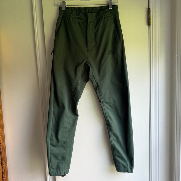 Nike Pants - Nike Womens Tech Essentials Woven Tapered Pants Dark Green Olive XS